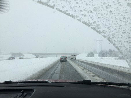 All Season Tires Driving On Highway Light Snow Conditions Image