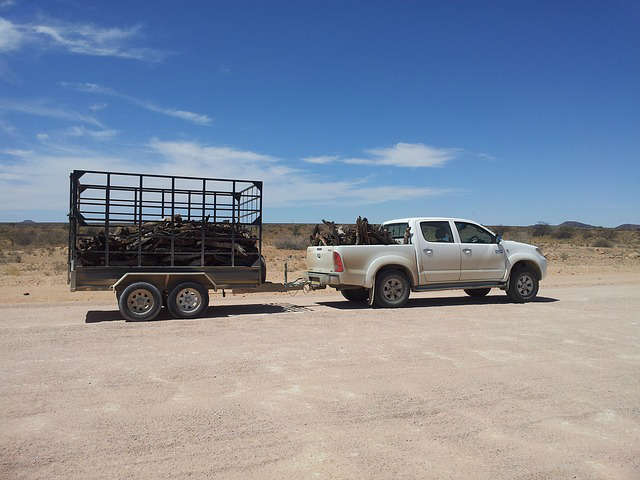 Heavy Duty Trailer Tires Carrying Wood In Utility Trailer